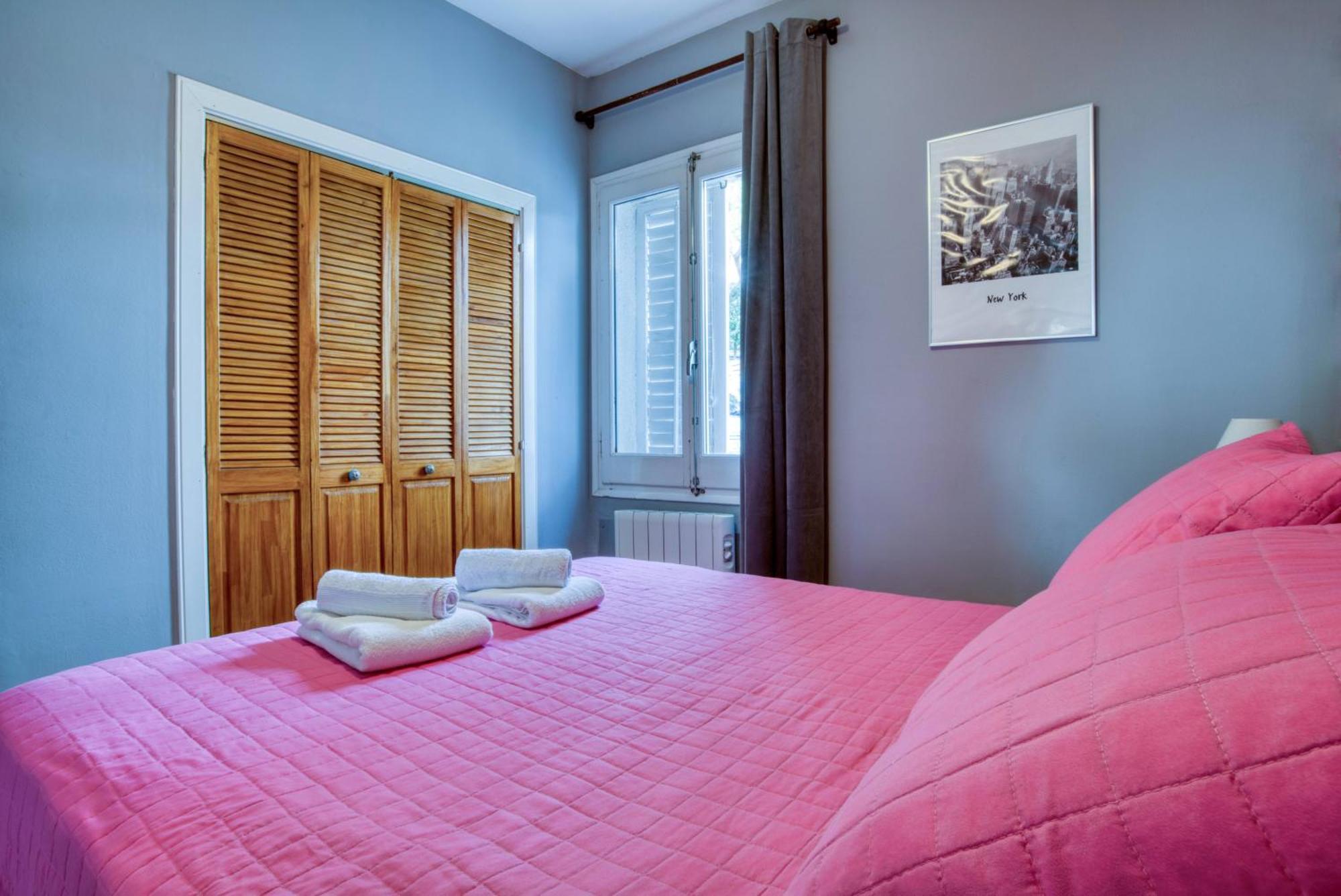 Double bedroom with wardrobe and fresh towels