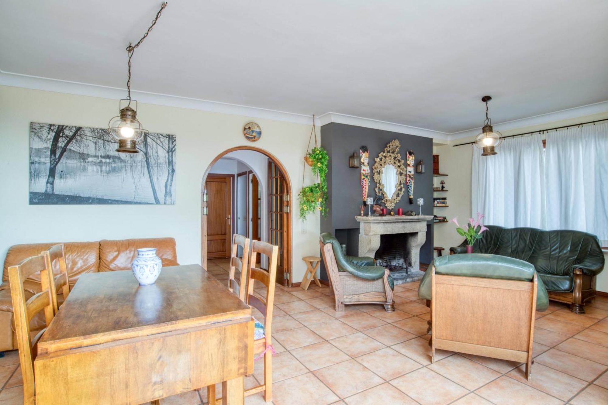 Dining area with fireplace and large table