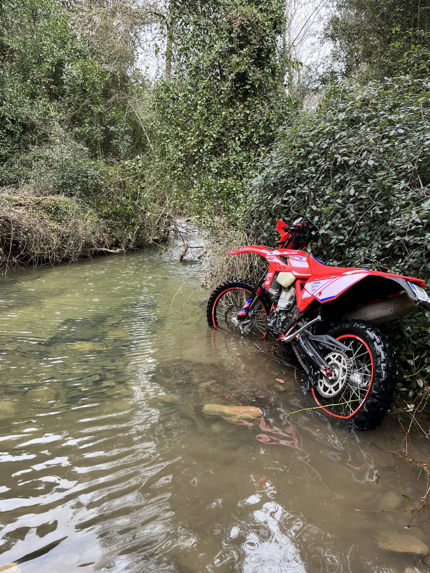 Beta RR 350 enduro motorcycle crossing a river